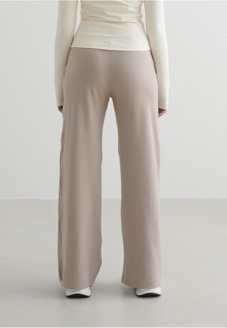 Loosefit Pantalon de sport 'Sense' Aim'n en beige