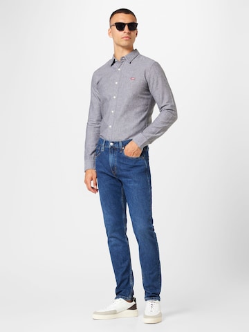 LEVI'S ® Tapered Jeans '512 Slim Taper Lo Ball' in Blauw