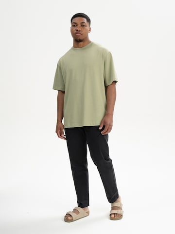 MELA T-shirt 'Bhajan' i grön