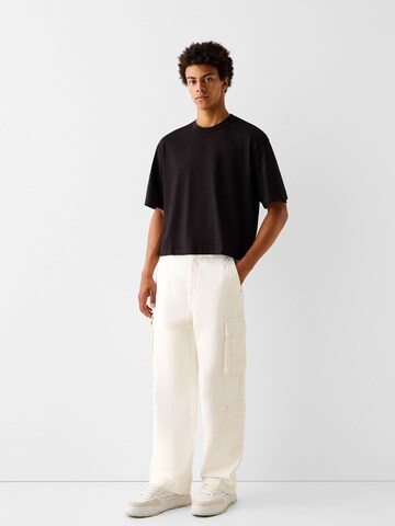 Bershka Loose fit Cargo trousers in White