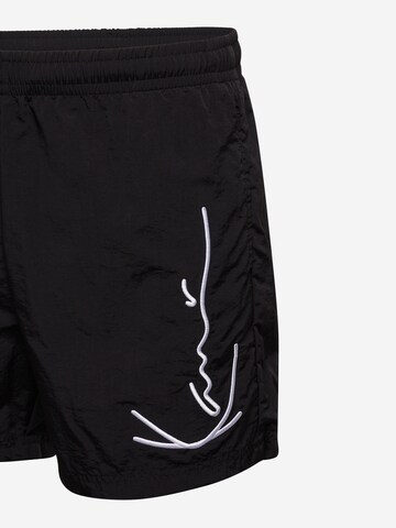 Karl Kani Loosefit Badeshorts in Schwarz