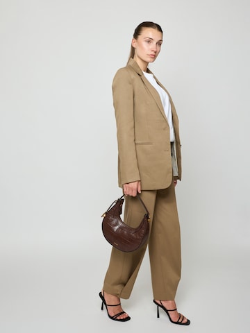 Picard Schultertasche 'Croissant' in Braun