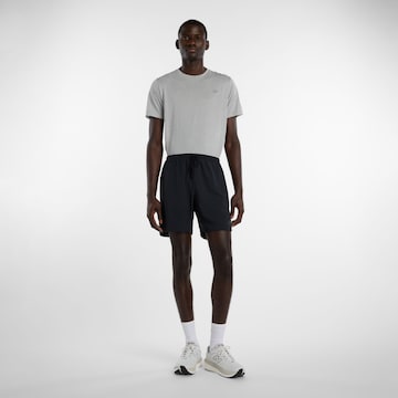 new balance - Regular Calças de desporto 'RC Essential Short 7"' em preto