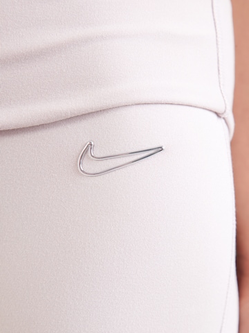 Nike Sportswear - Flared Calças em roxo