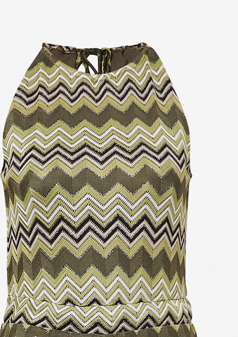 Combinaison COMMA en vert