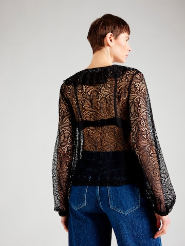 SISTERS POINT - Blusa 'VUTA' en negro