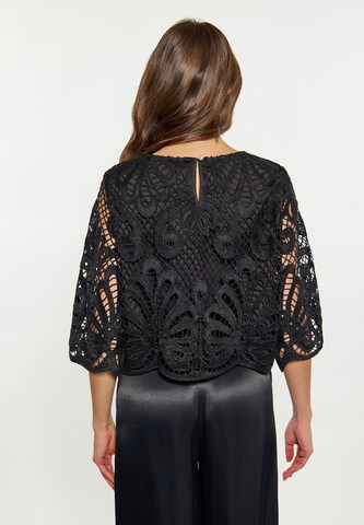 Camicia da donna di faina in nero