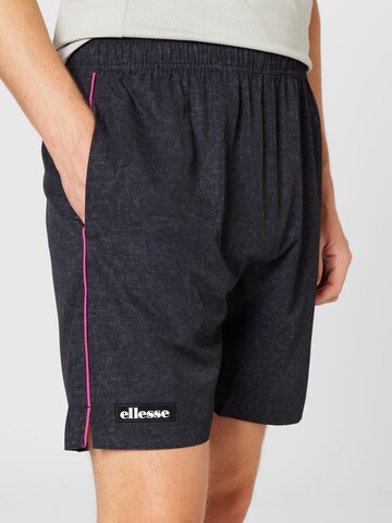 ELLESSE - Regular Calças de desporto em preto