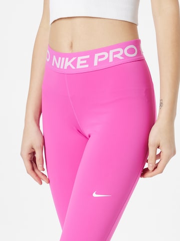 NIKE - Skinny Calças de desporto em rosa