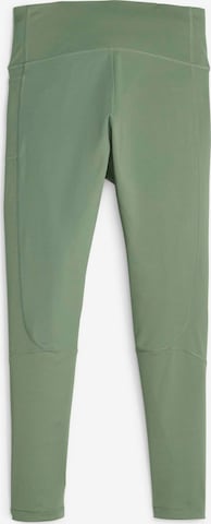 PUMASkinny Sportske hlače 'EVOSTRIPE' - zelena boja