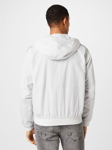 Calvin Klein Jeans Between-Season Jacket in Grey