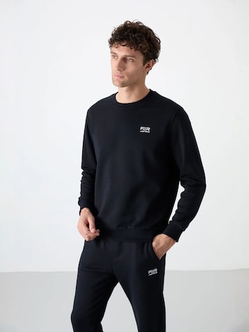 Tommy Life Joggingpak in Zwart