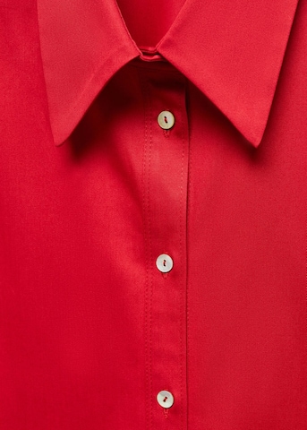 Bluză 'rojiza' de la MANGO pe roșu