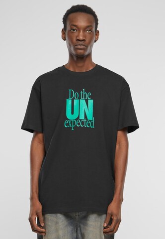 MT Upscale Shirt 'Do The Unexpected' in Zwart: voorkant