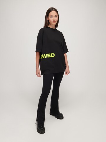 T-Shirt 'TEAM' UNFOLLOWED x ABOUT YOU en noir : devant