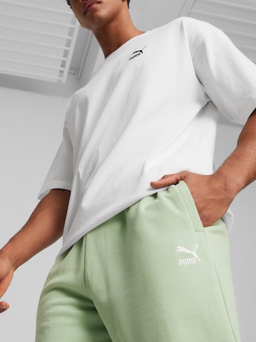 PUMA Normalny krój Spodnie 'BETTER CLASSICS' w kolorze zielony
