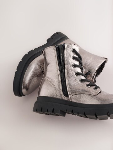 Bottes Next en argent