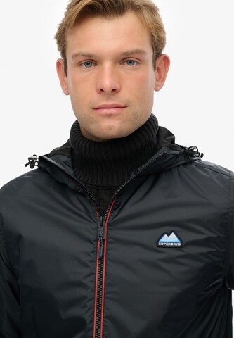 Veste mi-saison 'Essential' Superdry en bleu