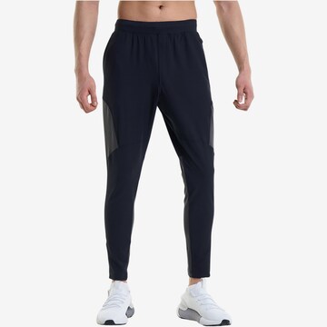 UNDER ARMOUR Regular Workout Pants 'Unstoppable Hybrid' in Black: front