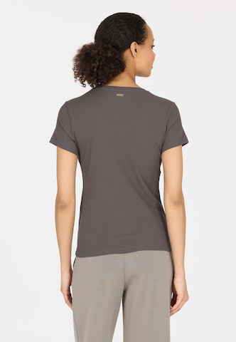 Athlecia Functioneel shirt 'Lankae' in Bruin