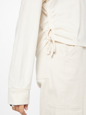 balta LEVI'S ® Marškinėliai 'Graphic Long Sleeve Cinched Tee'