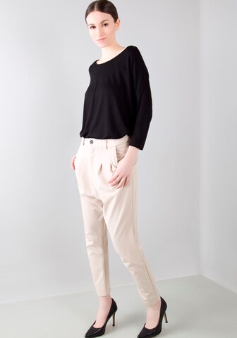 IMPERIAL Tapered Pleat-Front Pants in Beige