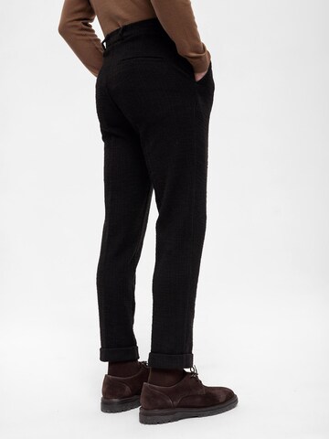 Antioch Slim fit Pleat-front trousers in Black