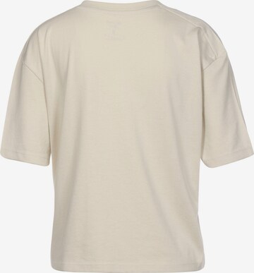T-shirt fonctionnel Reebok en beige