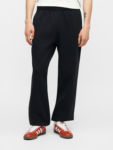 ADIDAS ORIGINALS Tapered Pants 'ESS' in Black: front