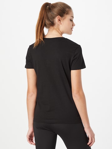 PUMA Sportshirt 'Classic' in Schwarz