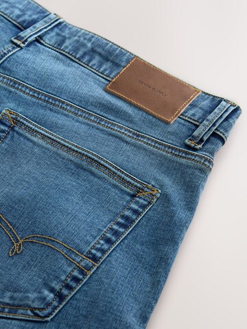 Coupe slim Jean 'Motion Flex' Next en bleu