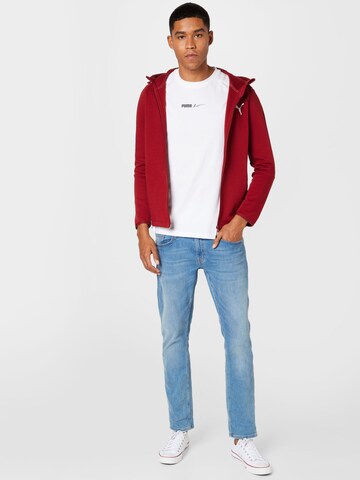 Veste de survêtement PUMA en rouge