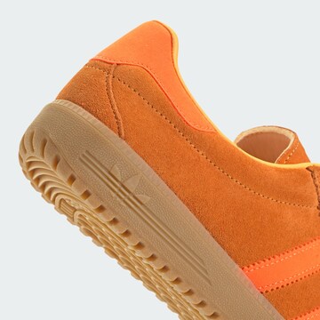 Baskets basses 'Brmd' ADIDAS ORIGINALS en orange