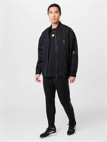 juoda ADIDAS SPORTSWEAR Siaurėjantis Sportinės kelnės 'Tiro Suit-Up Advanced'