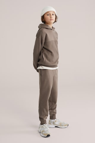 WE Fashion Tapered Trousers in Brown