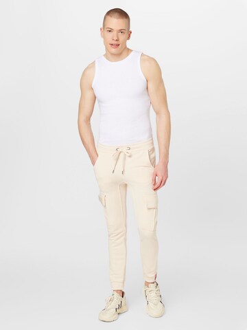 ALPHA INDUSTRIES - Tapered Pantalón cargo 'Terry' en beige