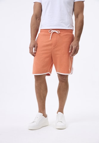 Felix Hardy Regular Trousers in Orange: front