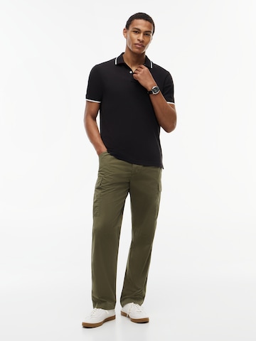 TOMMY HILFIGER Poloshirt in Schwarz