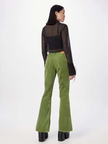 BDG Urban Outfitters Rozkloszowany krój Spodnie w kolorze zielony