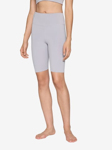 Girlfriend Collective Skinny Urheiluhousut 'Float' värissä lila: etupuoli