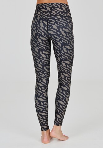 Athlecia Skinny Sportbroek 'Mist' in Bruin