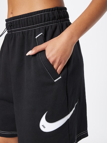 Nike SportswearWide Leg/ Široke nogavice Hlače - crna boja