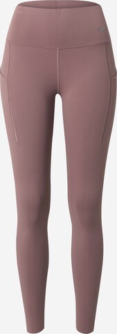 Skinny Pantalon de sport 'UNIVERSA' NIKE en marron : devant