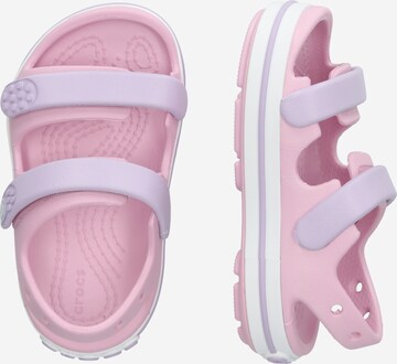 Crocs - Zapatos abiertos 'Cruiser' en rosa