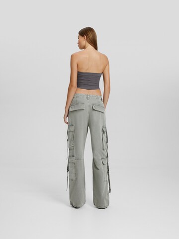 Bershka Loose fit Cargo trousers in Grey