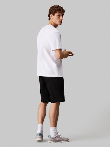 Regular Pantalon chino Calvin Klein Jeans en noir