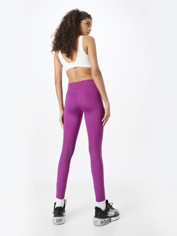 Skinny Pantaloni sportivi di NIKE in rosa