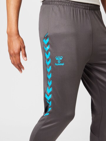 Effilé Pantalon de sport Hummel en gris