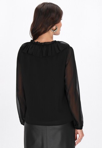faina - Blusa en negro