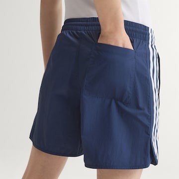 ADIDAS ORIGINALS Szabványos Nadrág 'Sprinter' - kék